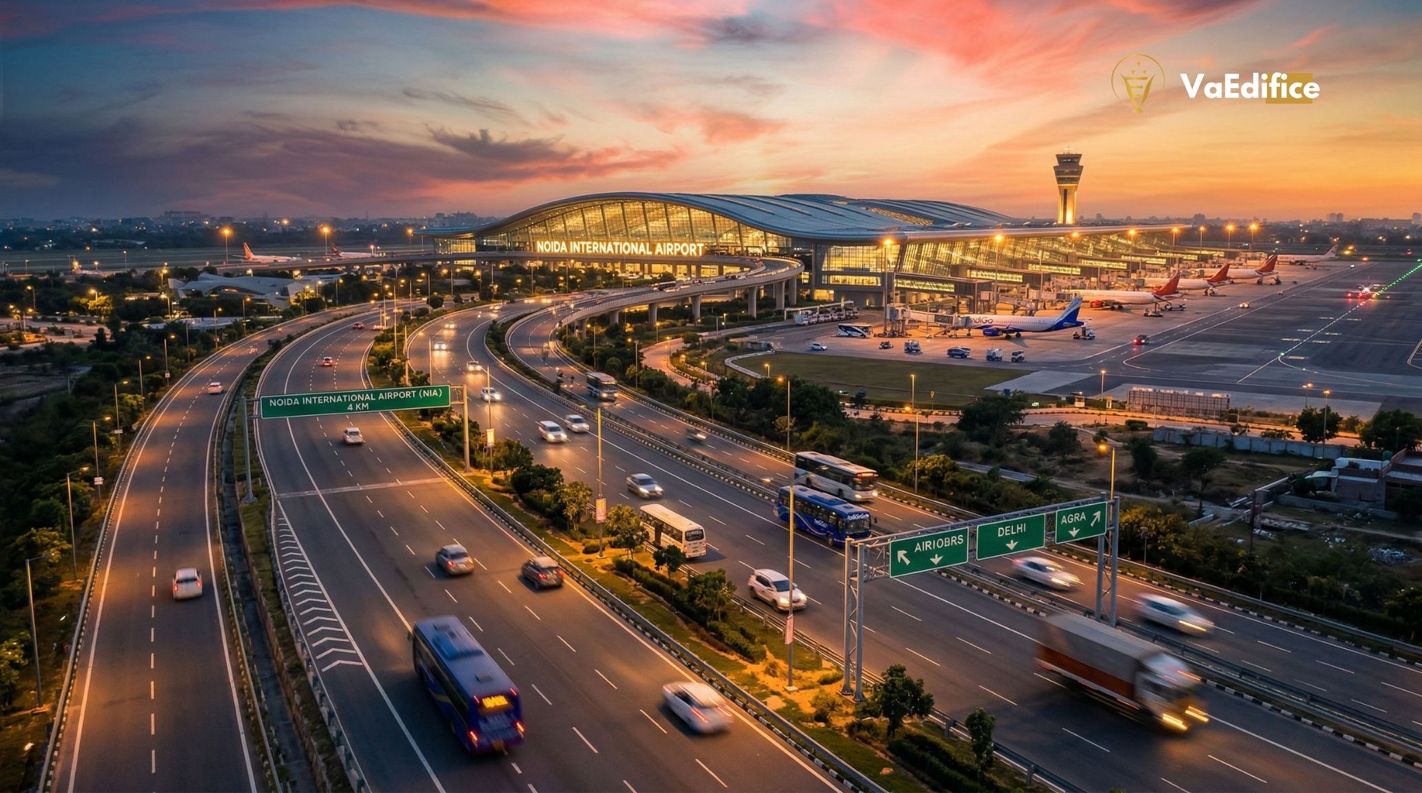Aerial view of the new Noida International Airport (Jewar Airport) at sunset, highlighting the massive infrastructure development driving real estate and property price surges in the NCR region.